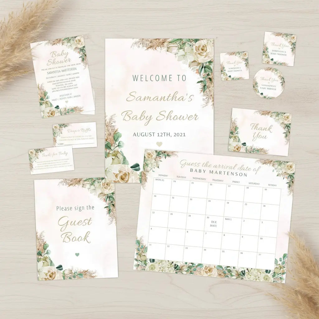 Collection of baby shower invitation, party supplies, and decor items with boho floral designs on a light background with pampas grass.