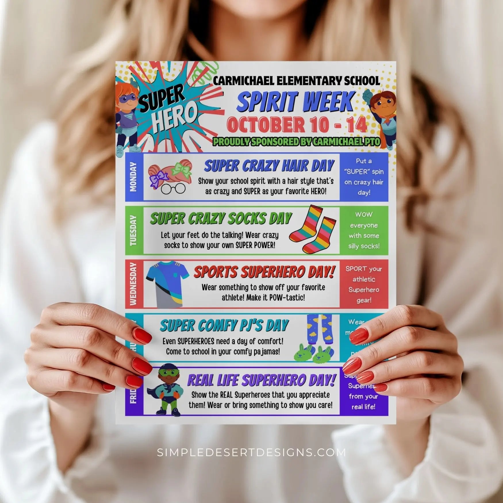 Person holding a colorful 'Super Hero Spirit Week' flyer from Carmichael Elementary School.