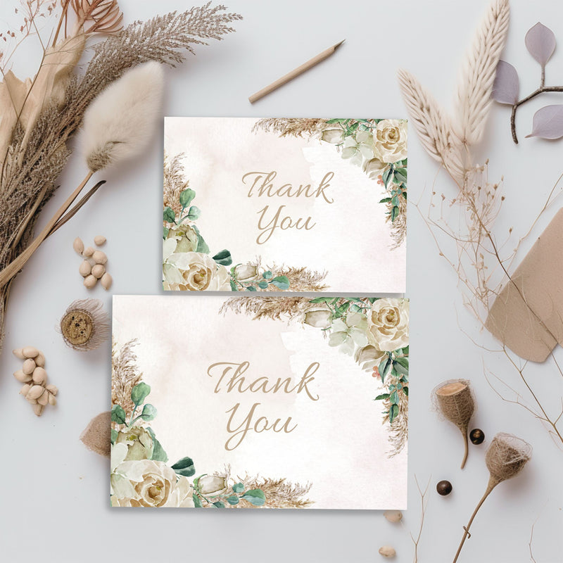 modern boho floral thank you cards in two sizes on decorated table