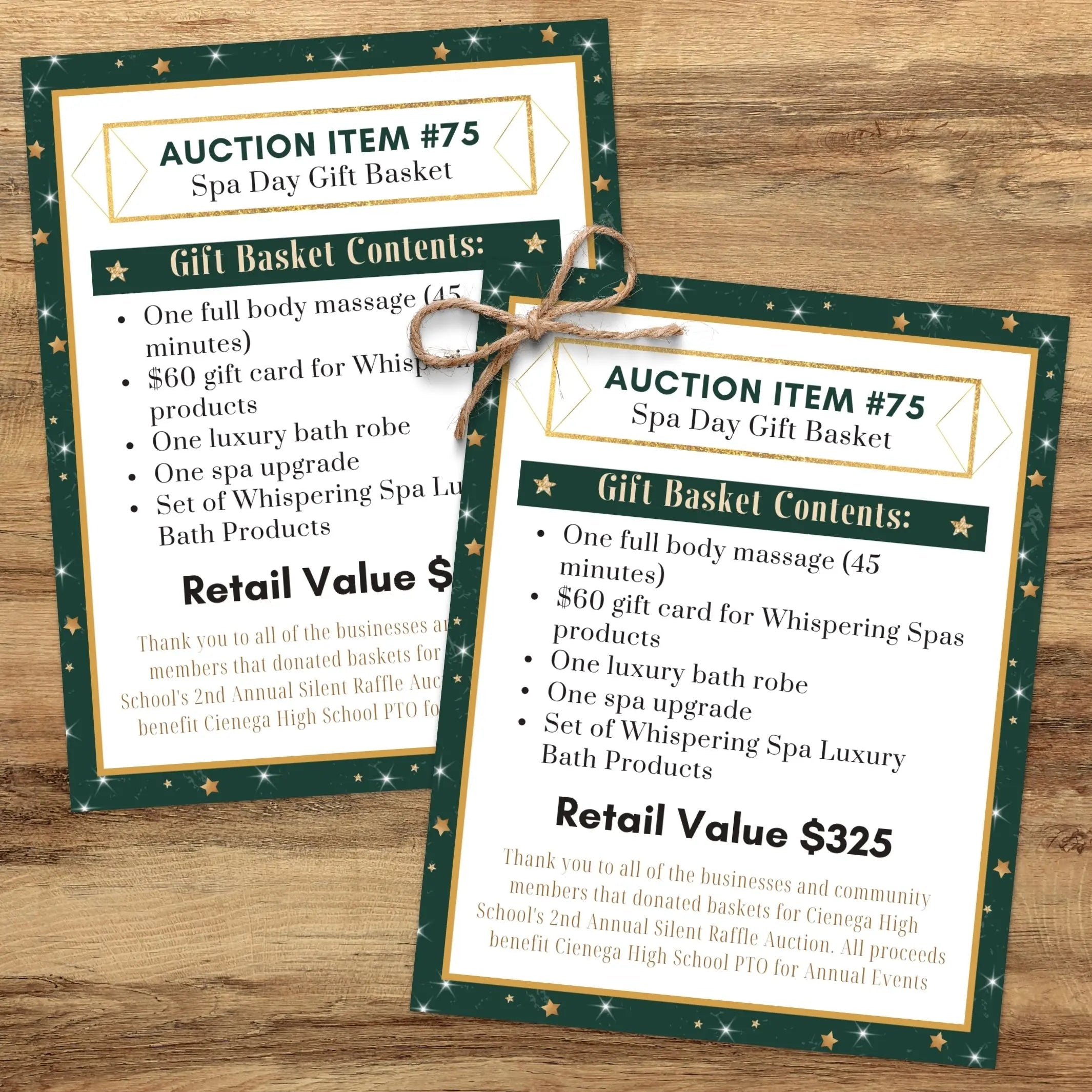 Two elegant green, white and gold customizable spa day gift basket auction tags on a wooden surface