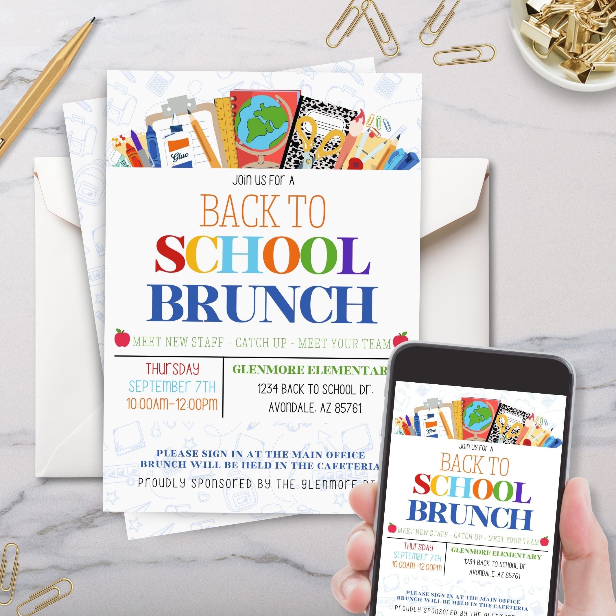 back to school brunch invitation on cell phone and printed with envelope on marble surface with gold pen and paperclips