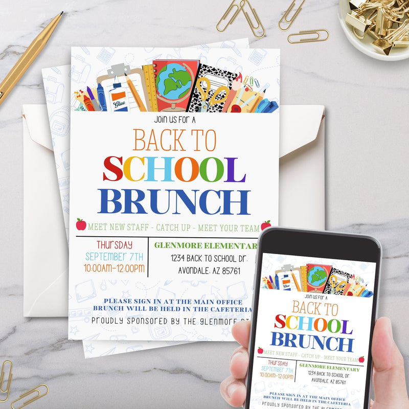 back to school brunch invitation on cell phone and printed with envelope on marble surface with gold pen and paperclips
