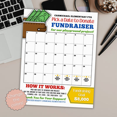 Fundraiser calendar for Carmichael Elementary PTO on a desk with office supplies.