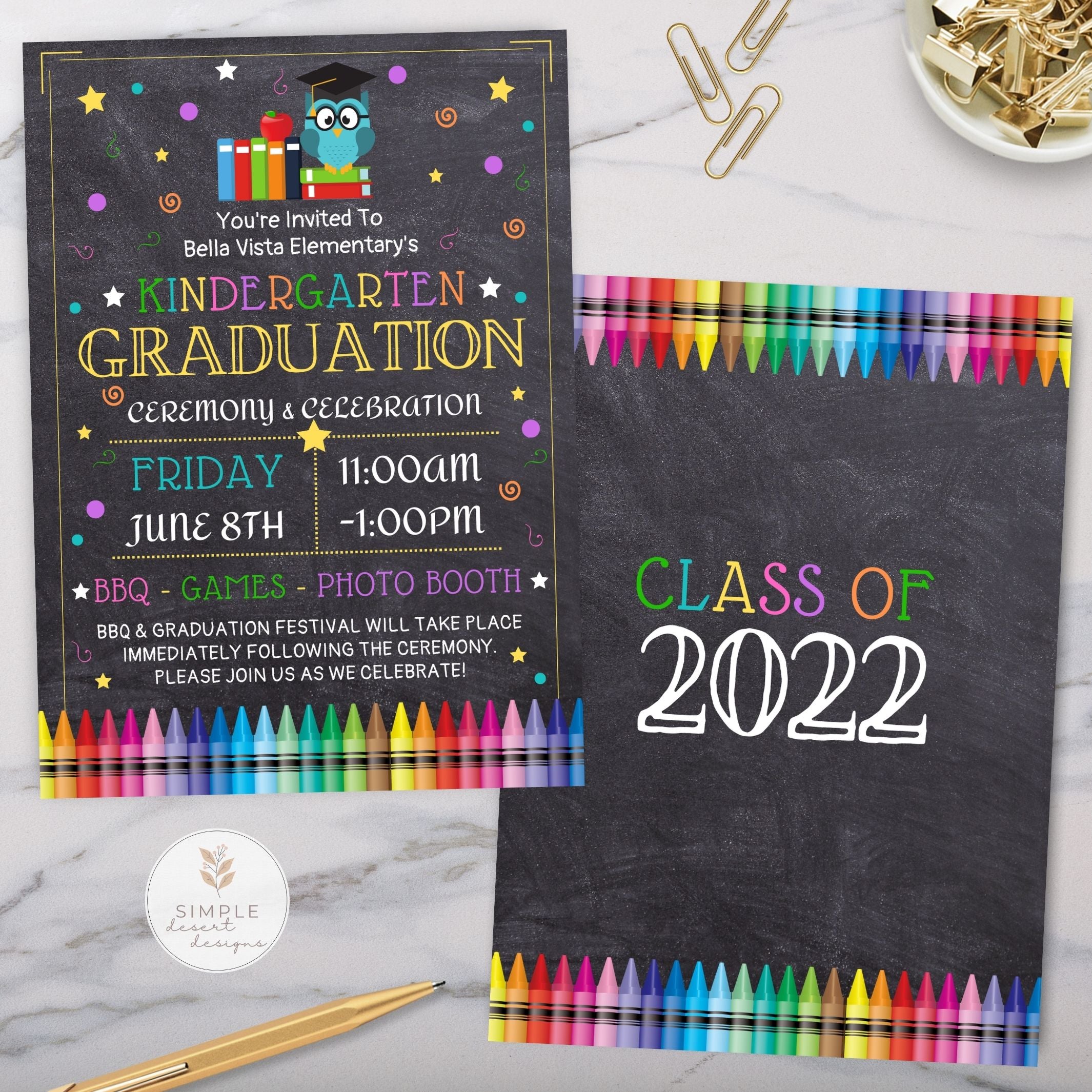 Kindergarten graduation invitation with colorful crayons on a marble surface