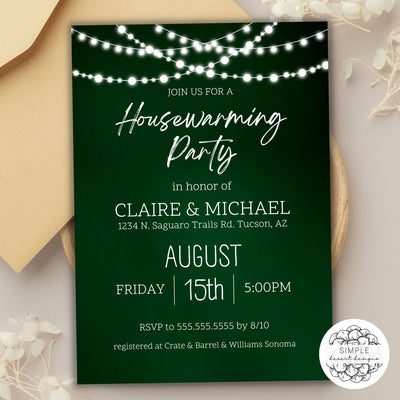 elegant green housewarming party invitation with string lights on table setting