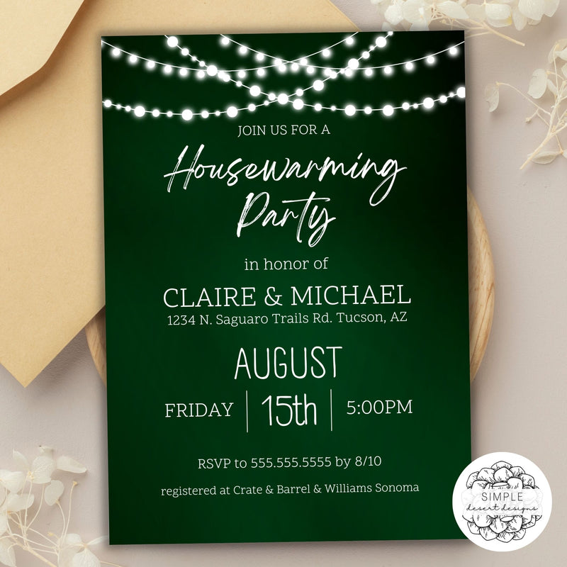 elegant green housewarming party invitation with string lights on table setting