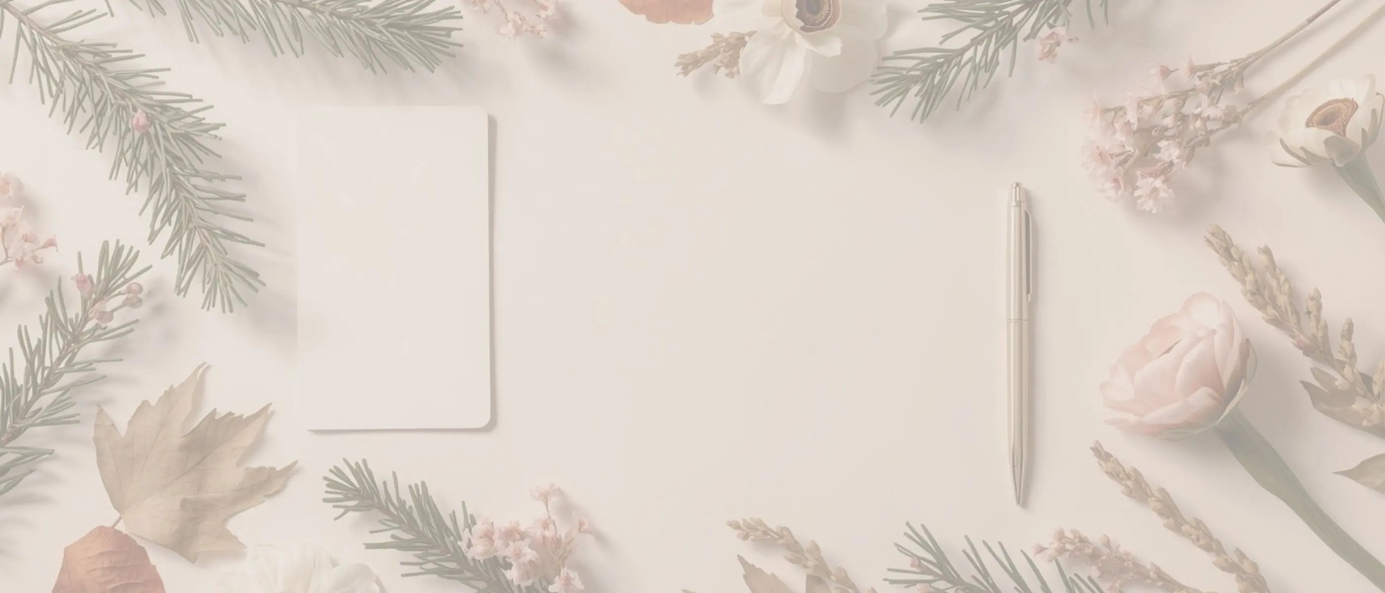 Blank card with pen and decorative flowers  and greenery from all four seasons on a light background representing editable holiday and seasonal event invitations and flyer templates by Simple Desert Designs.