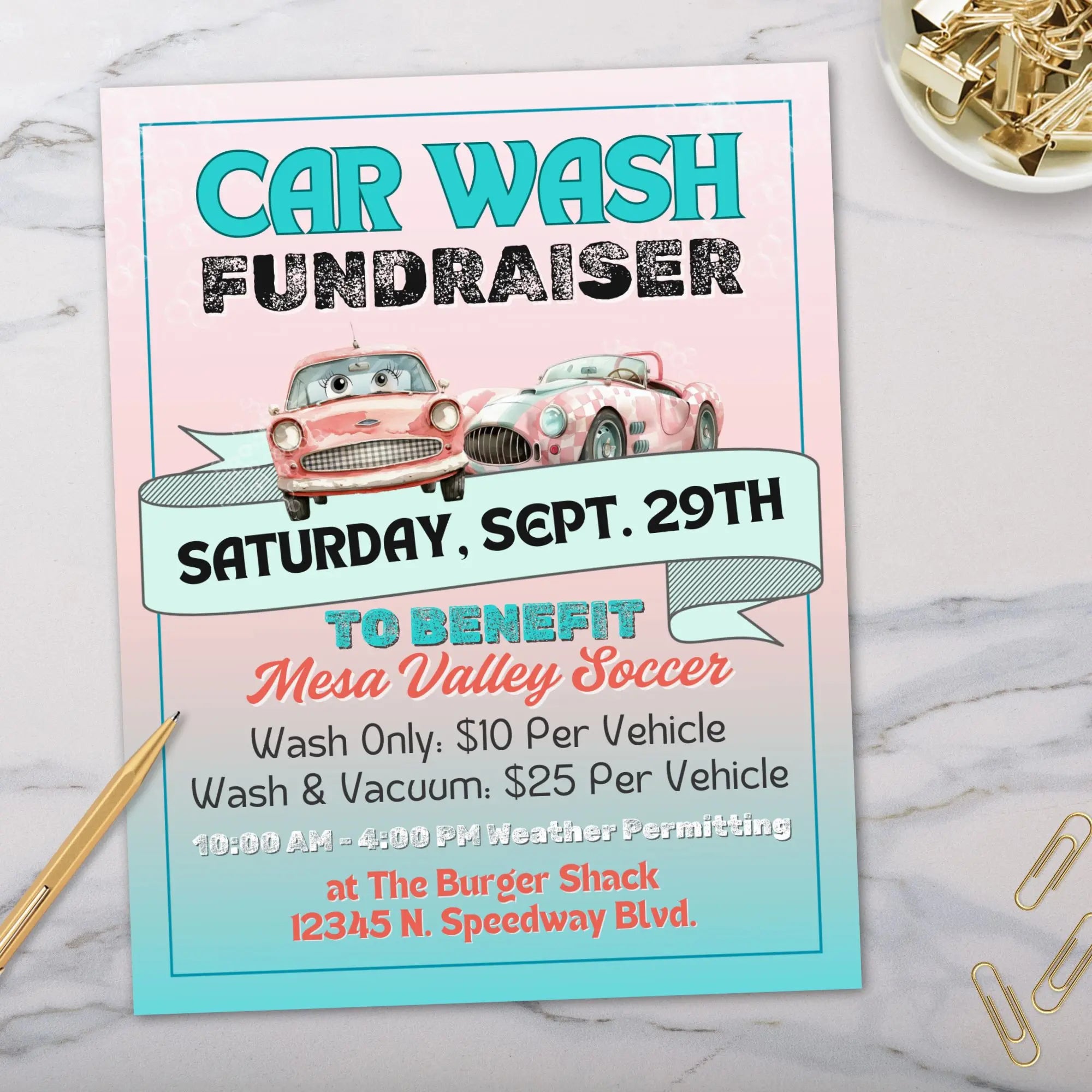 Pink and teal 50s retro car wash flyer template customized for Mesa Valley Soccer on a marble surface with a gold pen and paper clips.