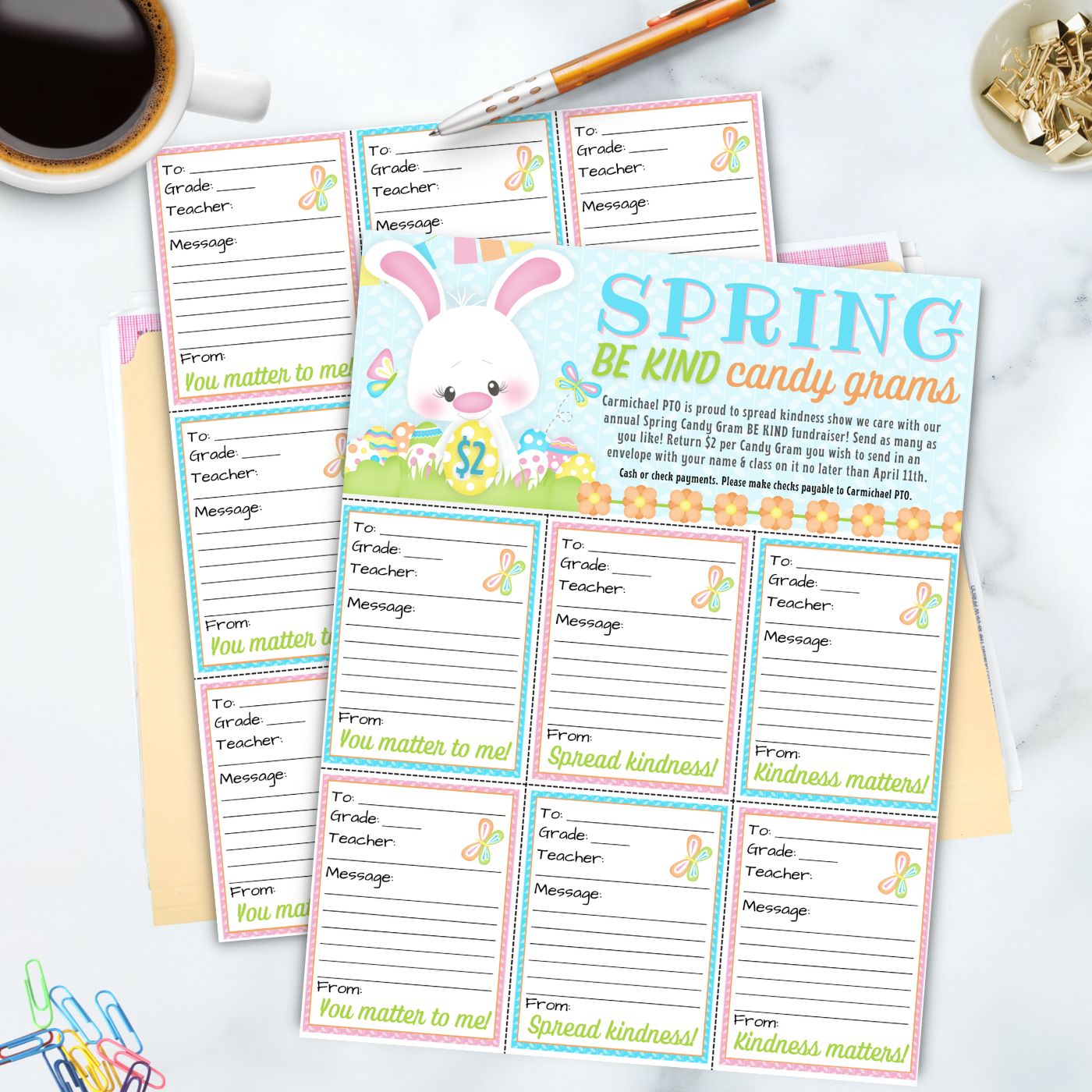 Spring-themed candy gram printables on a white surface with a coffee cup and paper clips.