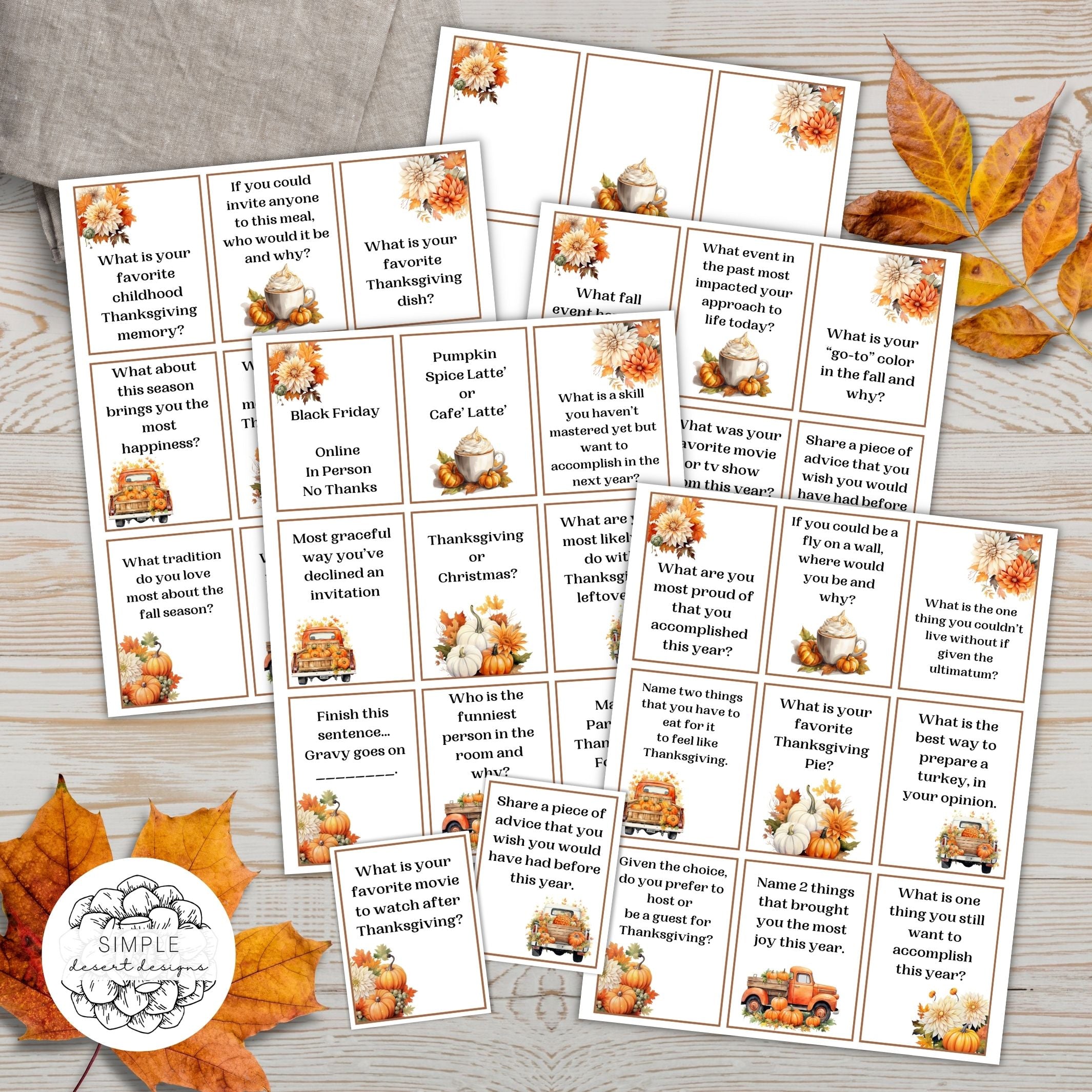 Elegant thanksgiving conversation starter cards printed on wood surface with fall decor including blank printable sheet for party hosts.